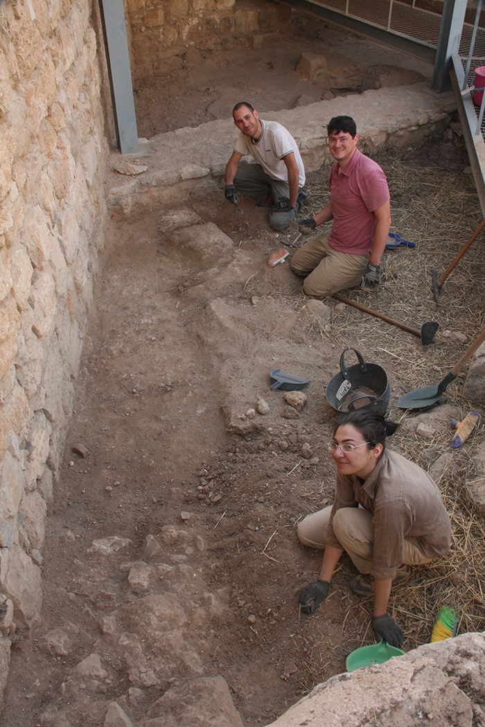 Marco, Hew, and Maddalena exposing the original floors.