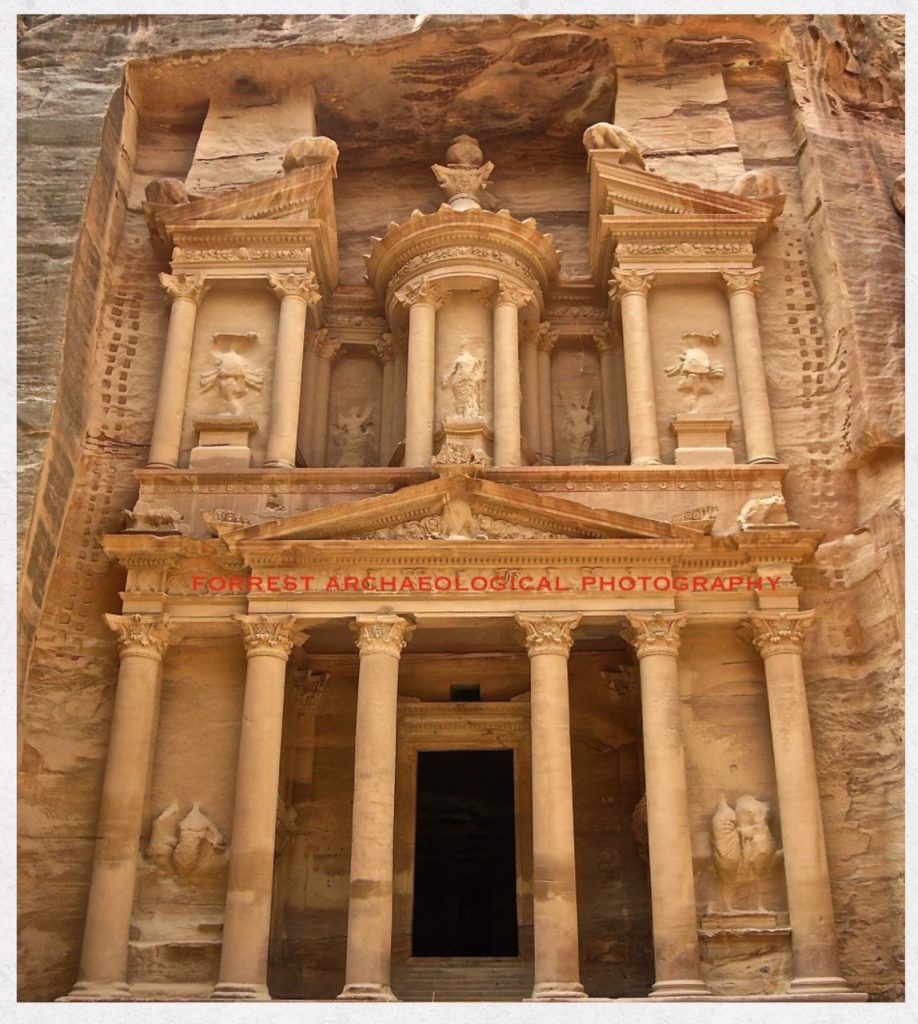 Image courtesy of Brandy Forrest One of the most frequently photographed sites at Petra, the treasury is not just about the building itself, but also the workers who built it. The eye of an archaeologist and photographer notes the placement of the small footholds used by the workers over 2000 years ago to build the ancient city of Petra, which are clearly evident in this image.